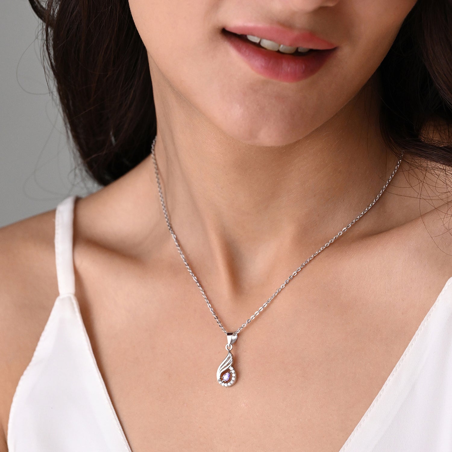 Niharika 925 Silver Purple Stone Wing Pendant with Chain