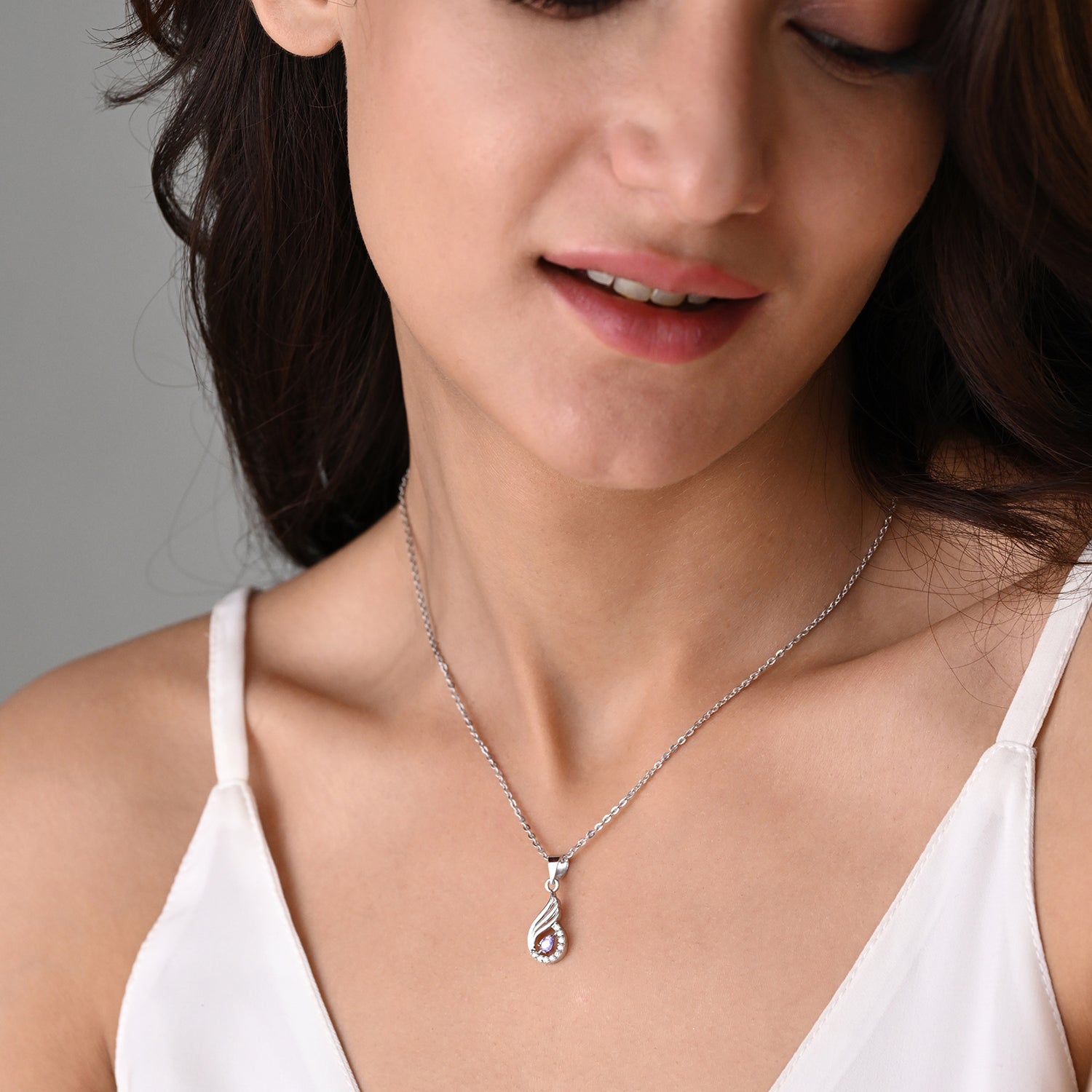 Niharika 925 Silver Purple Stone Wing Pendant with Chain